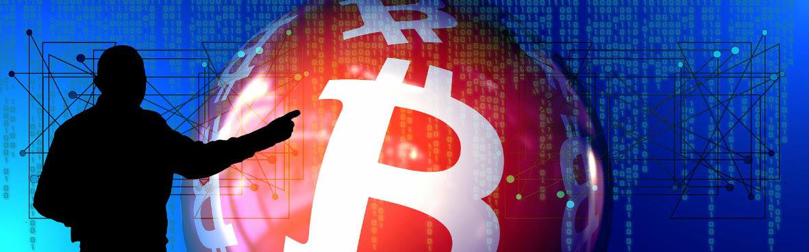 Cień postaci wskazujący palcem na symbol bitcoina